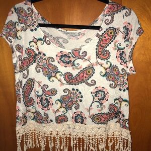 cropped white shirt with lace design at bottom